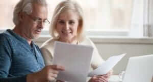 Older couple looking at papers together