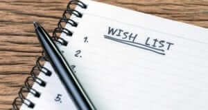 a notepad numbered 1-5 for a wish list