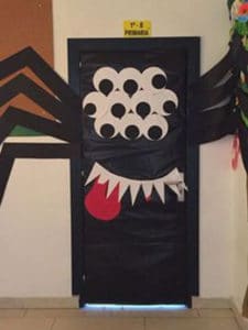 Classroom door decorated as a black spider