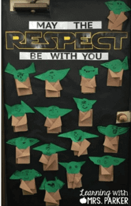Classroom door that says "May the respect be with you" covered in baby yoda's created by students