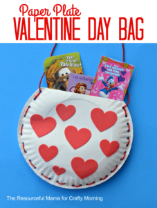 a bag made out of paper plates to hold valentine's cards with yarn and red hearts on it
