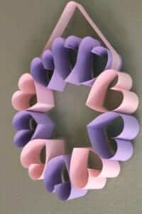 Wreath of hearts made from pink and purple construction paper