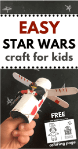 Star wars craft made out of toilet paper tube, paint, and craft sticks