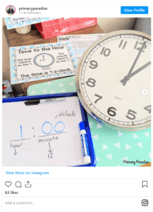 An Instagram post about teaching students how to tell time. There's a whiteboard and clock.