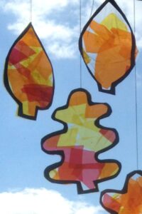 fall leaf suncatcher craft made with pipe cleaners and tissue paper